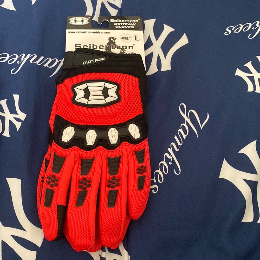 Bike Gloves, brand new still in plastic.